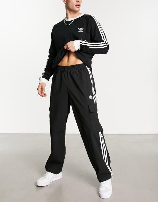 Adidas originals adicolor three stripe track pants discount in black