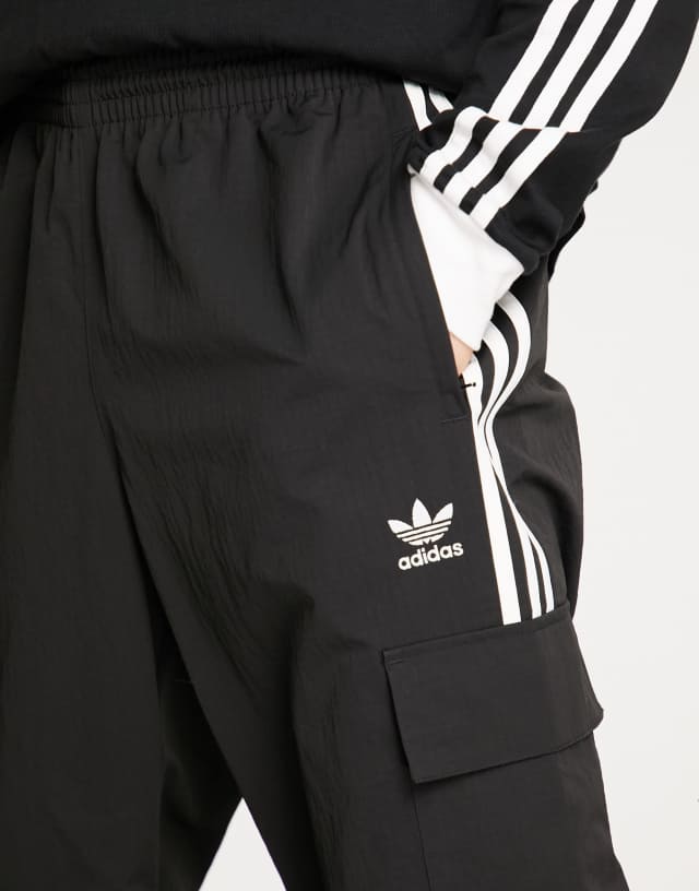 adidas Originals adicolor three stripe cargo sweatpants in black 2