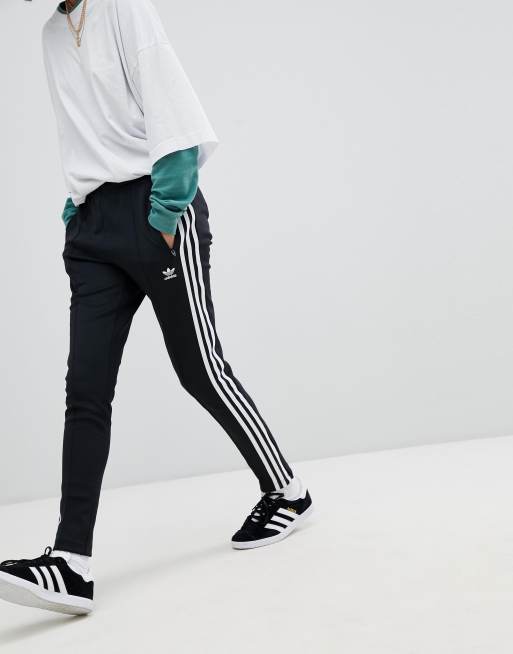 adidas Originals adicolor three stripe wide leg trousers in black, ASOS