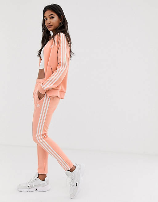 adidas Originals adicolor three stripe cigarette pant in pink | ASOS