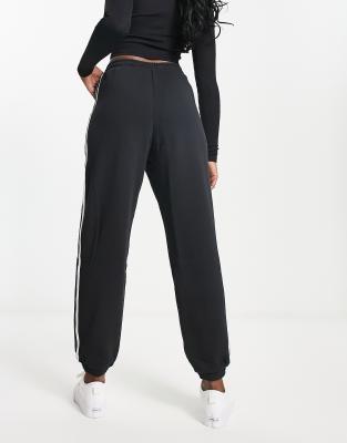 adidas originals adicolor three stripe cuffed joggers in black