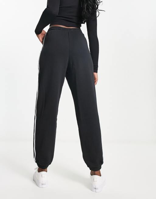 Adidas track pants cuffed women's sales