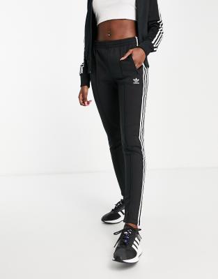 adidas originals three stripe cuffed sweat pants in black