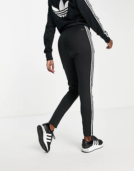 Tracksuits adidas Originals adicolor three stripe cuffed joggers in black 