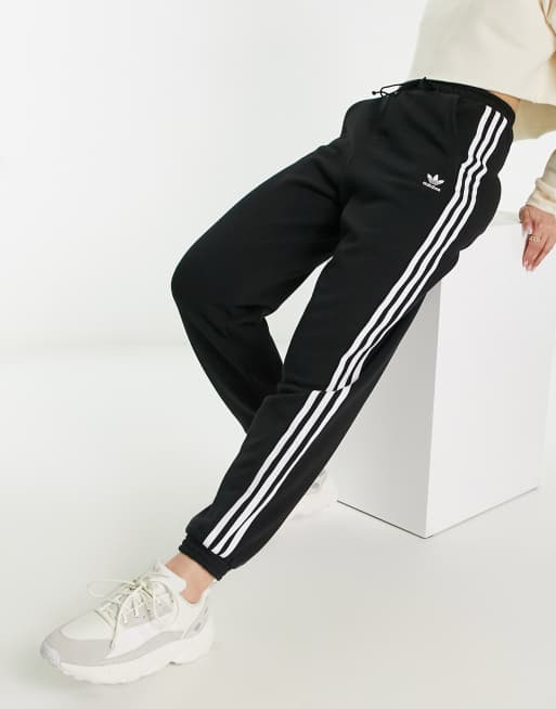 adidas Originals adicolor three stripe cuffed joggers in black