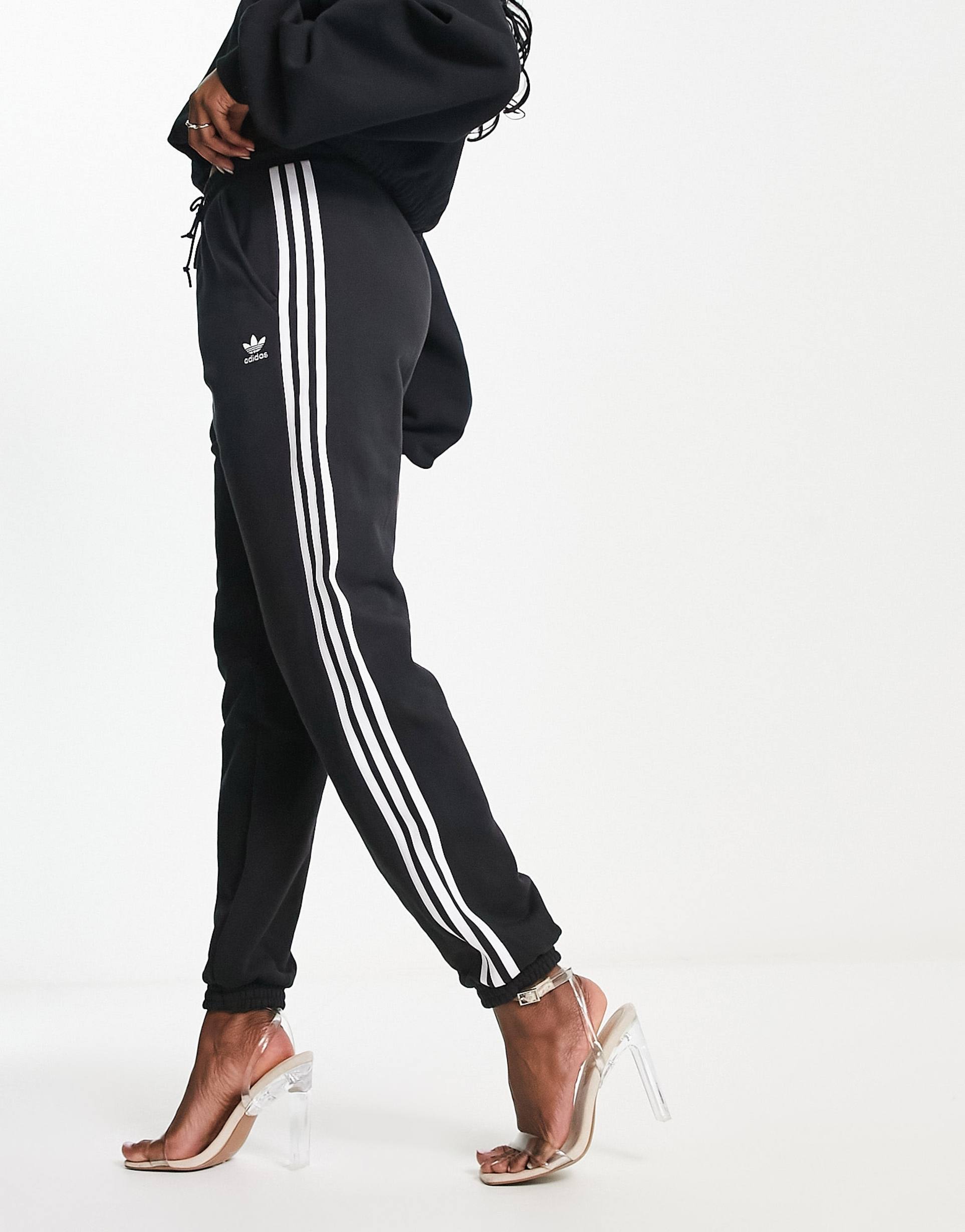 adidas Originals adicolor three stripe cuffed joggers in black view 2