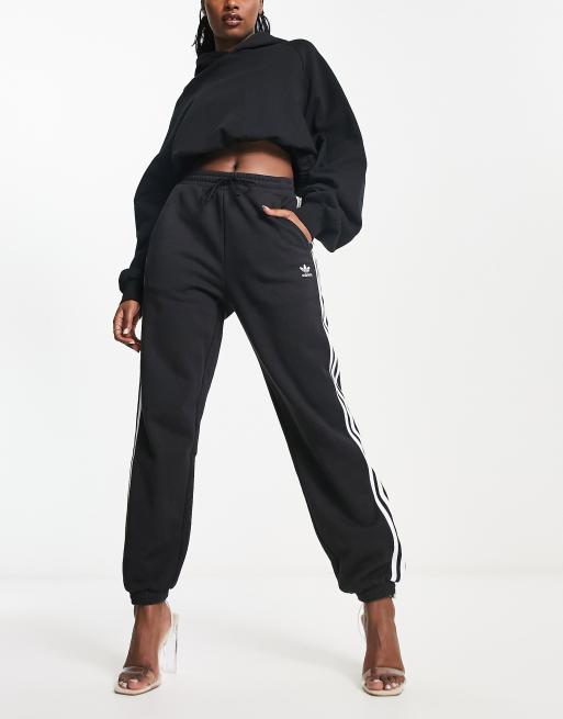 adidas Originals adicolor three stripe cuffed joggers in black