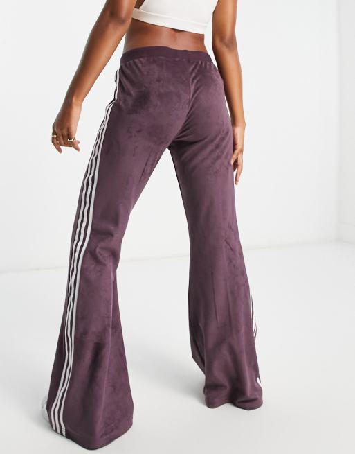 adidas Originals adicolor three stripe faux suede flared track pants in  maroon