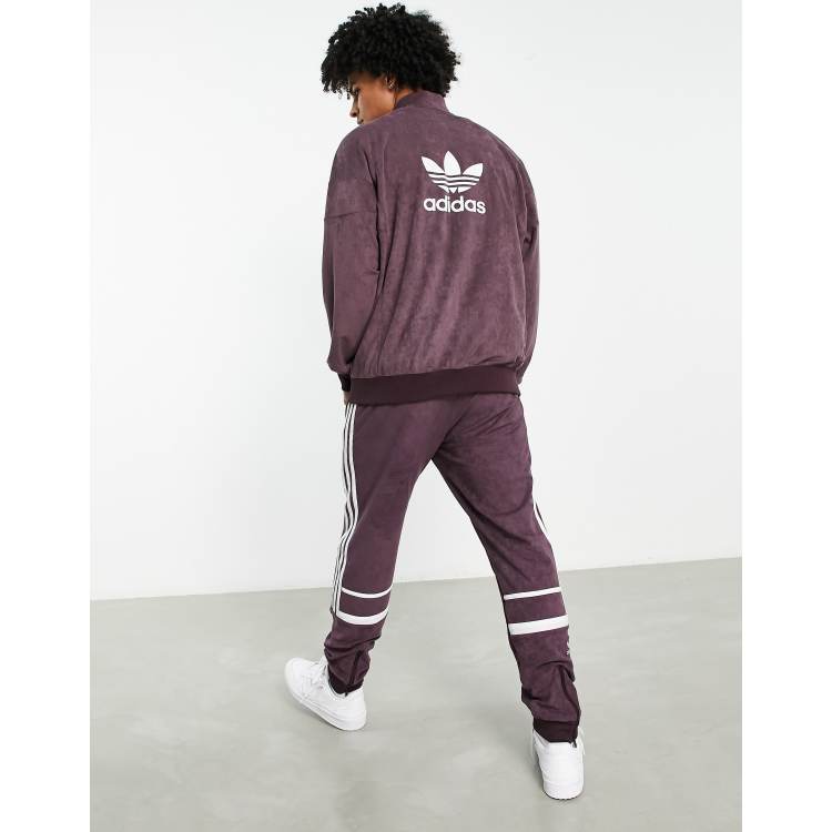 adidas Originals adicolor three stripe faux suede track jacket in