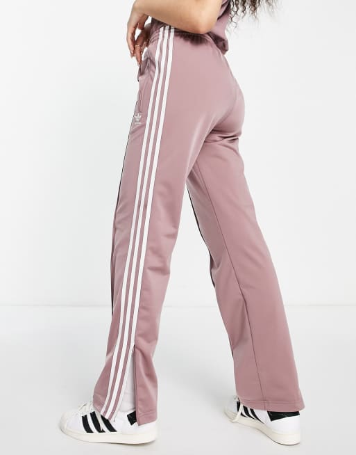 Adidas original three stripe track pant with vintage logo in pink best sale