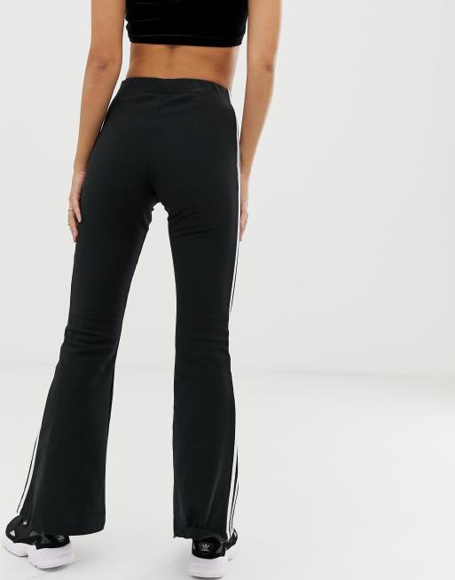 Adidas originals adicolor three stripe flared pants top in black