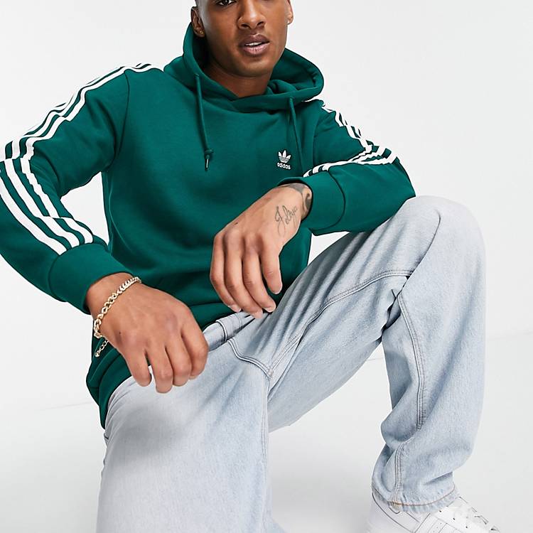estante Comprometido Extremo adidas Originals adicolor three stripe hoodie in collegiate green | ASOS