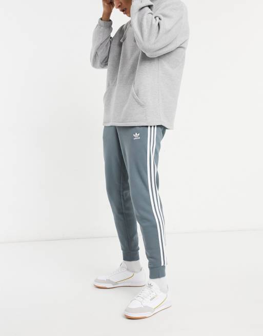 Grey adidas tracksuit discount with green stripes