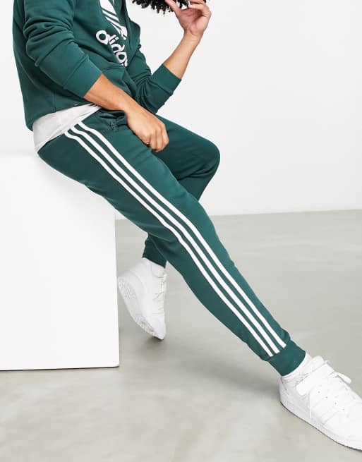 Green 3 stripe pants sales