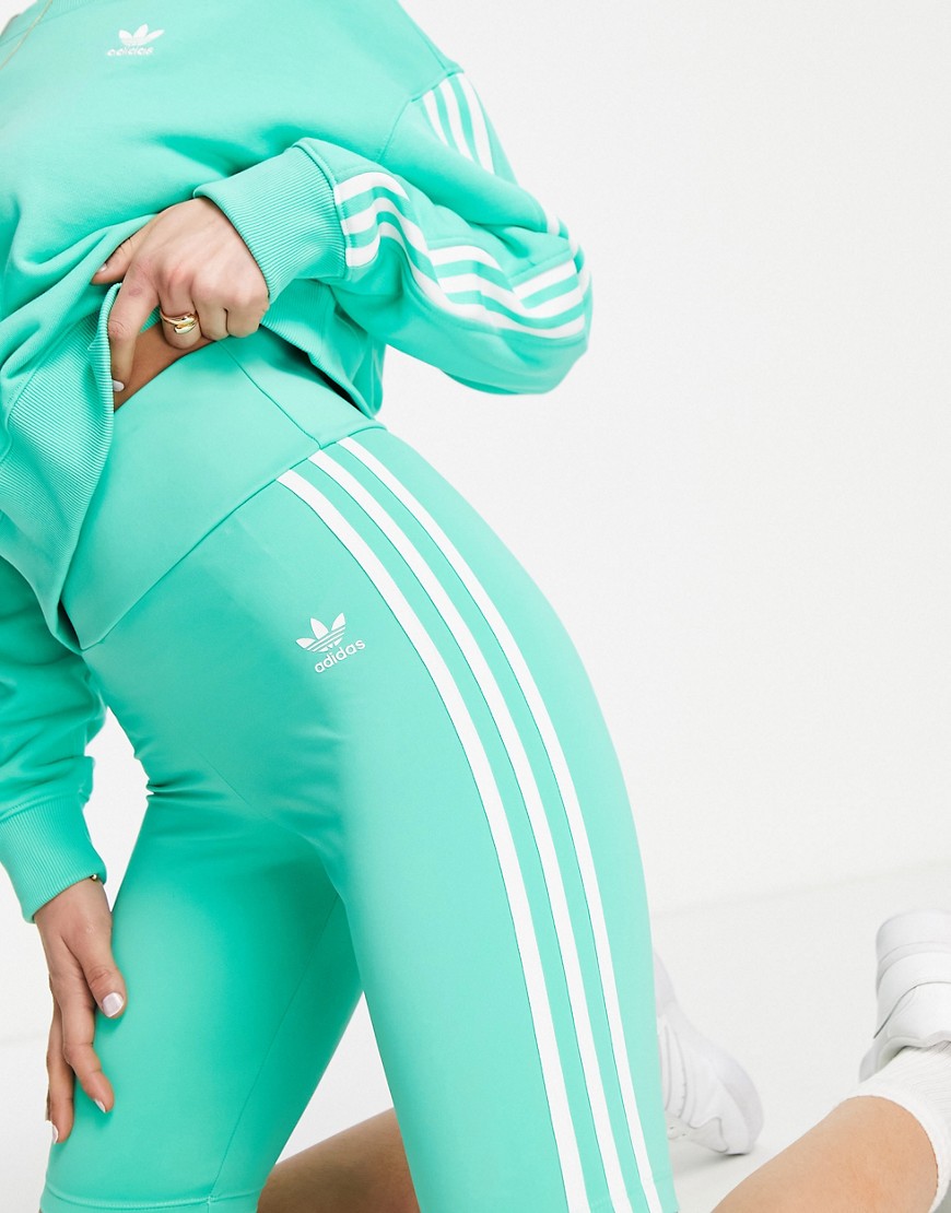 adidas Originals adicolor three stripe legging short in green-Blue