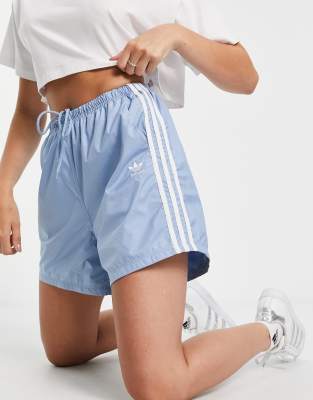 adidas Originals adicolor three stripe long length shorts in blue