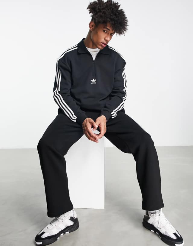 adidas Originals adicolor three stripe long sleeve polo top in black