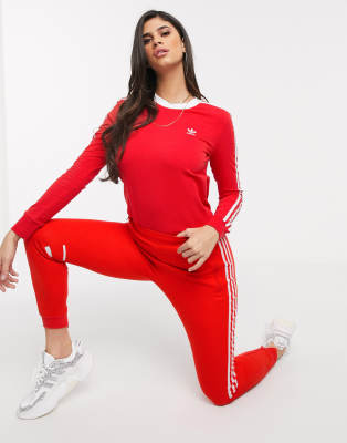 adidas originals adicolor three stripe track pants in red
