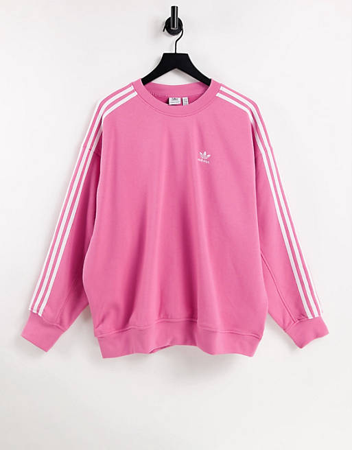 Women adidas Originals adicolor three stripe oversized sweatshirt in pink 