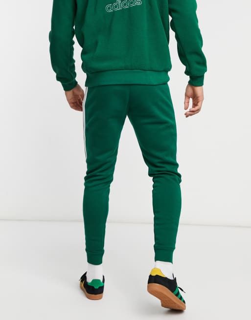 Adidas originals adicolor three stripe cigarette pant in green cheap