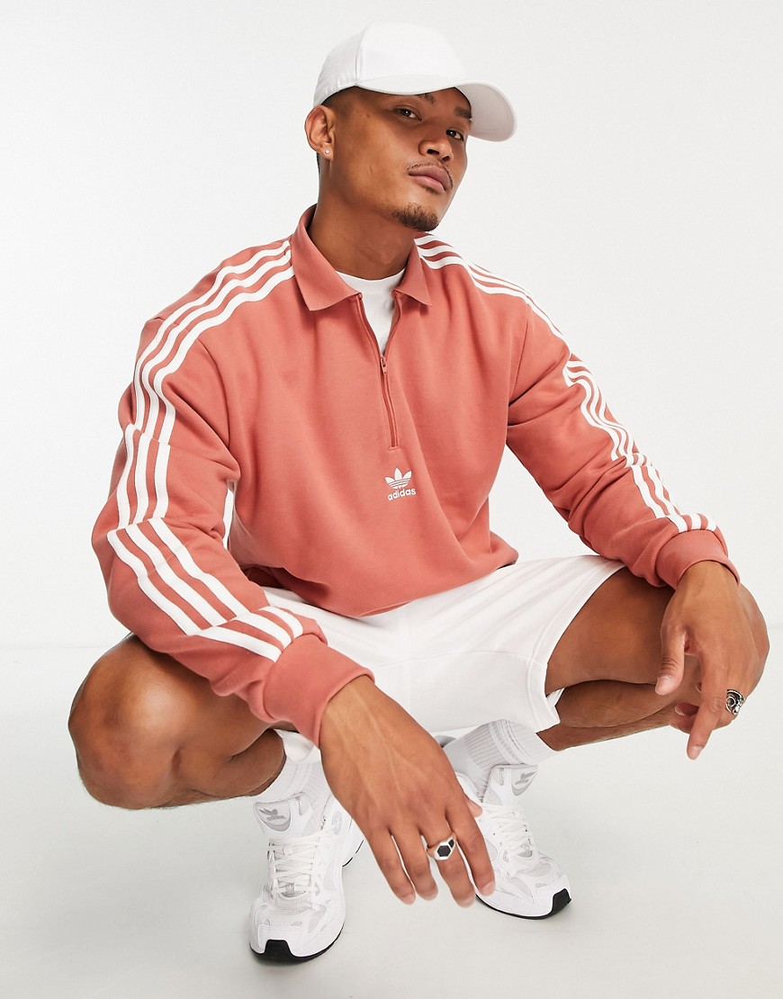 Adidas Originals adicolor three stripe polo top in pink-Brown