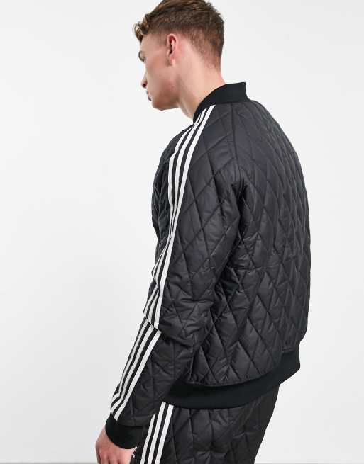 adidas Originals adicolor three stripe quilted track jacket in