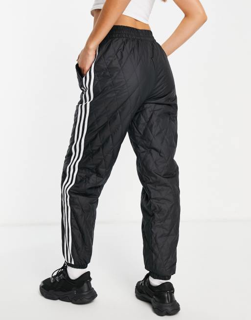 en prisión Afirmar adidas Originals adicolor three stripe quilted track pants in black | ASOS