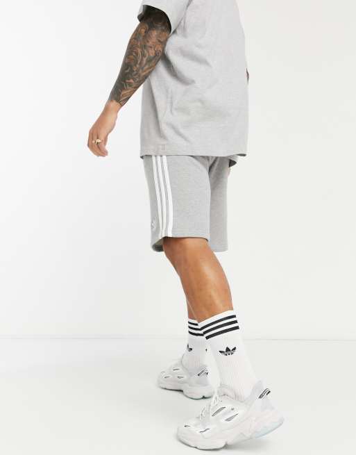 Grey and white adidas shorts top
