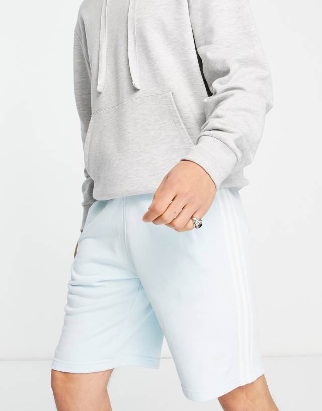 adidas Originals adicolor three stripe shorts in almost blue