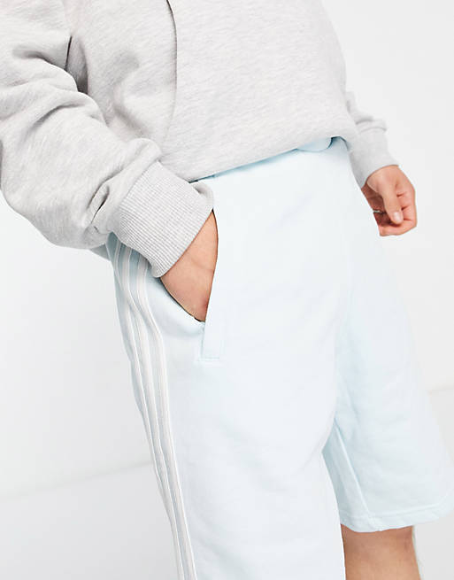 adidas Originals adicolor three stripe shorts in almost blue | ASOS