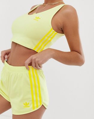 adidas originals adicolor three stripe shorts in neon yellow