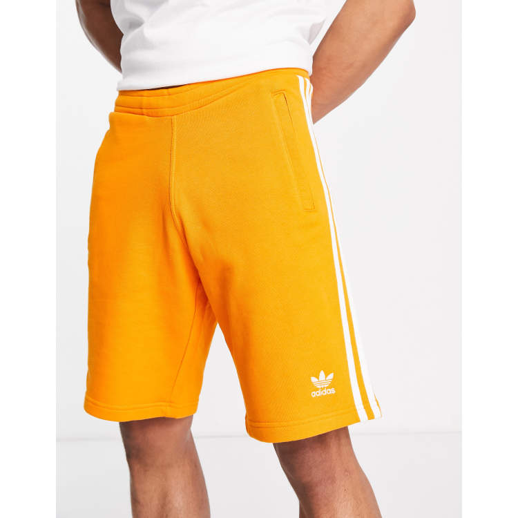 Adidas shorts orange stripes store