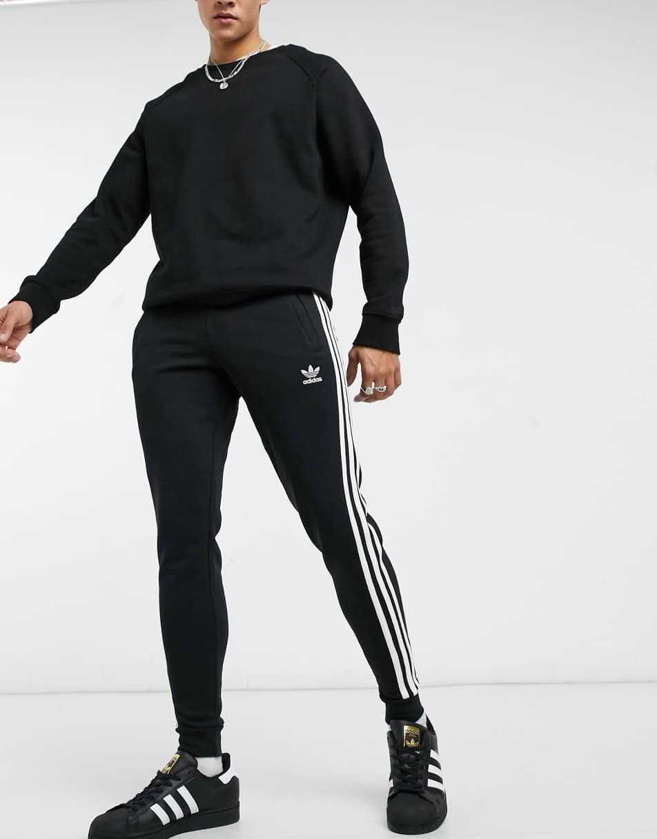 adidas Originals adicolor three stripe skinny joggers in black 2