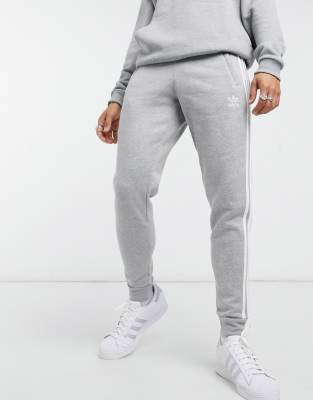 adidas Originals adicolor three stripe skinny joggers in grey heather