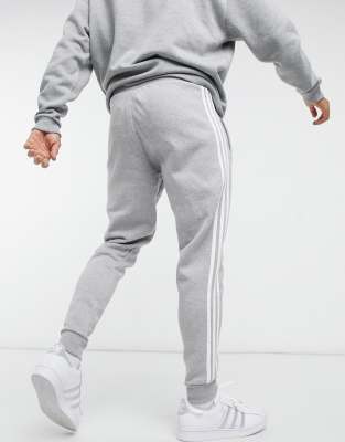 grey sweatpants with black stripe