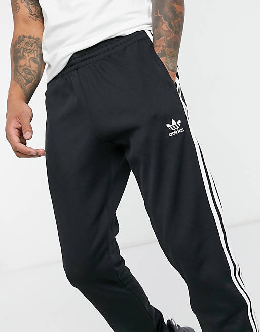 adidas Originals adicolor three stripe skinny sweatpants in black | ASOS