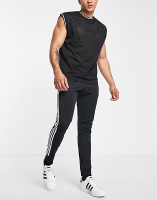 adidas originals adicolor three stripe track pants in black
