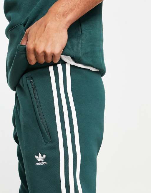 adidas Originals adicolor three stripe high waist leggings in green with  drawstring waist, ASOS