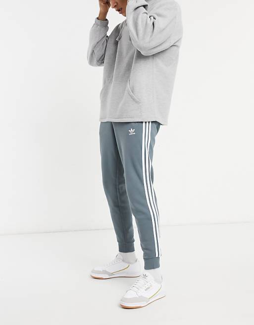 adidas Originals adicolor three stripe sweatpants set in teal green | ASOS