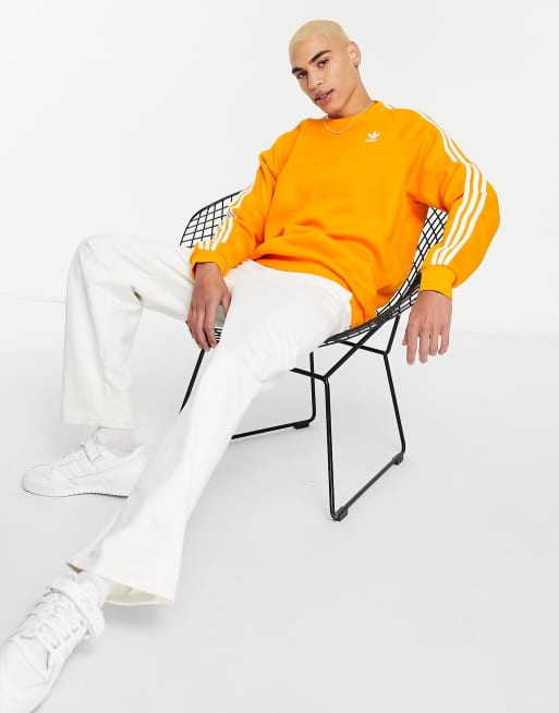 Adidas originals three stripe sweatshirt in orange clearance