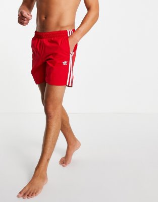 adidas Originals adicolor three stripe swim short in red