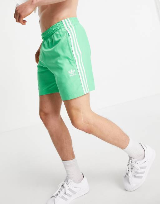 Adidas shorts green stripe hotsell