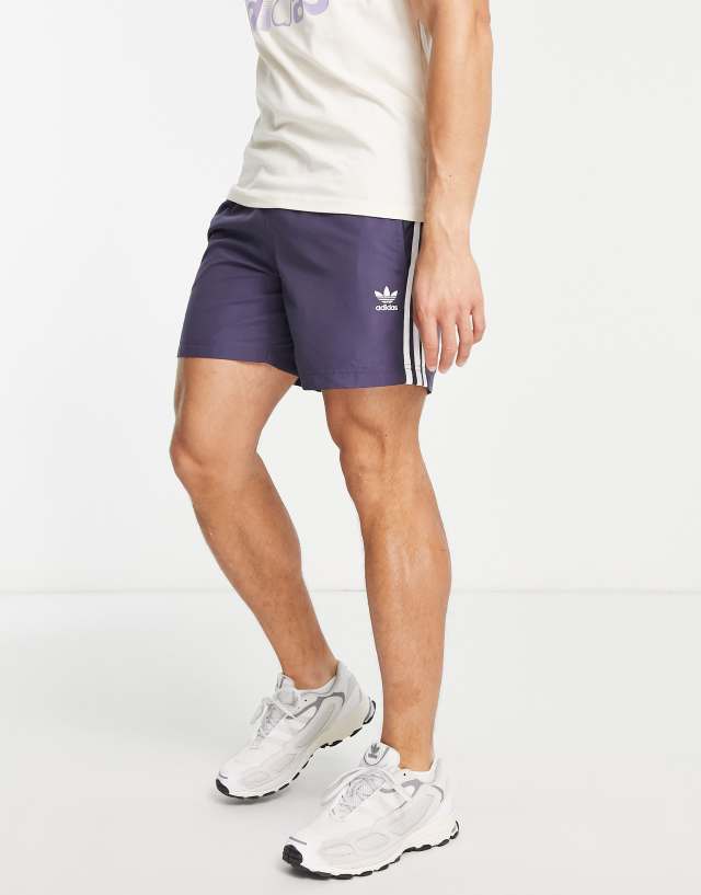adidas Originals adicolor three stripe swim shorts in navy 1