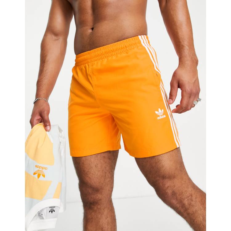Orange adidas shop shorts