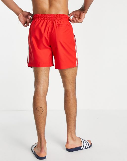 adidas Originals adicolor three stripe swim shorts in red | ASOS