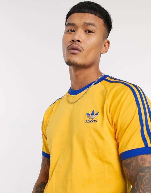adidas Originals adicolor three stripe t shirt in gold