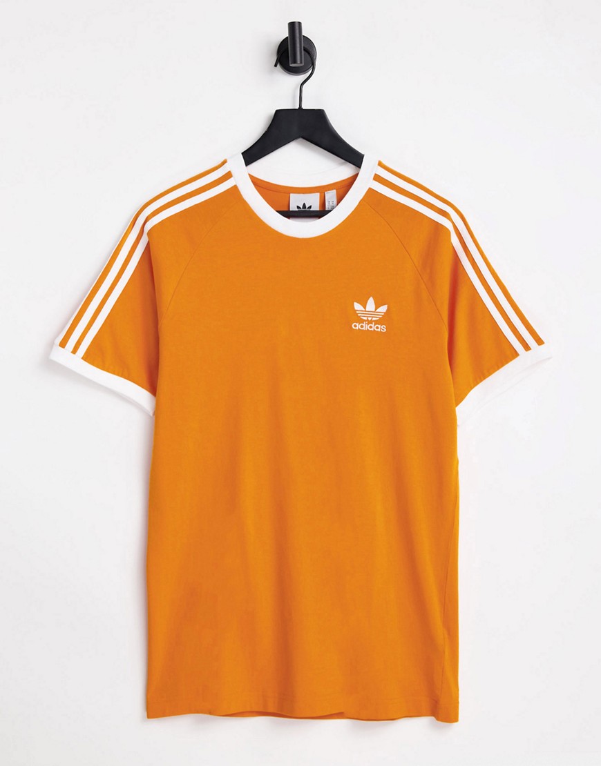 adidas Originals adicolor three stripe t-shirt in orange