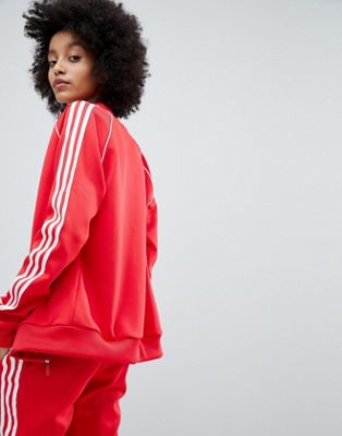 adidas originals adicolor three stripe track jacket in red