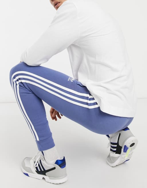Adidas originals three stripe track pant in blue on sale