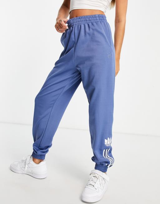 adidas Originals adicolor three stripe track pants in blue